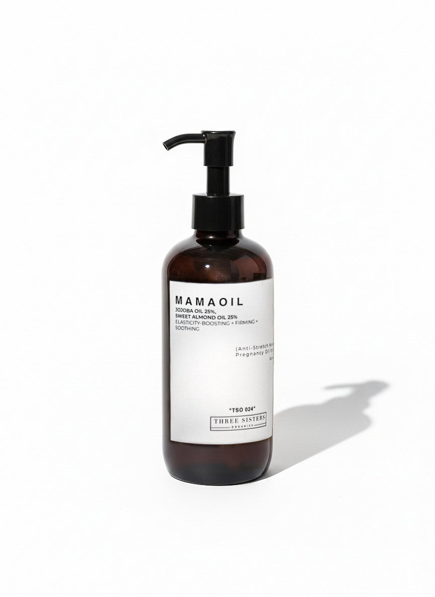 Brown bottle of Pregnancy massage Oil with pump and white label on a white background