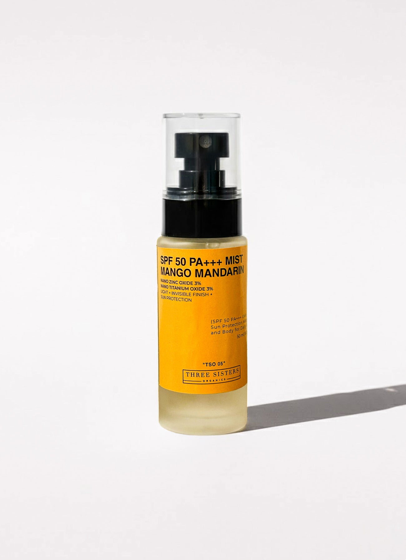 Sun protection Mist bottle with yellow label on a white background