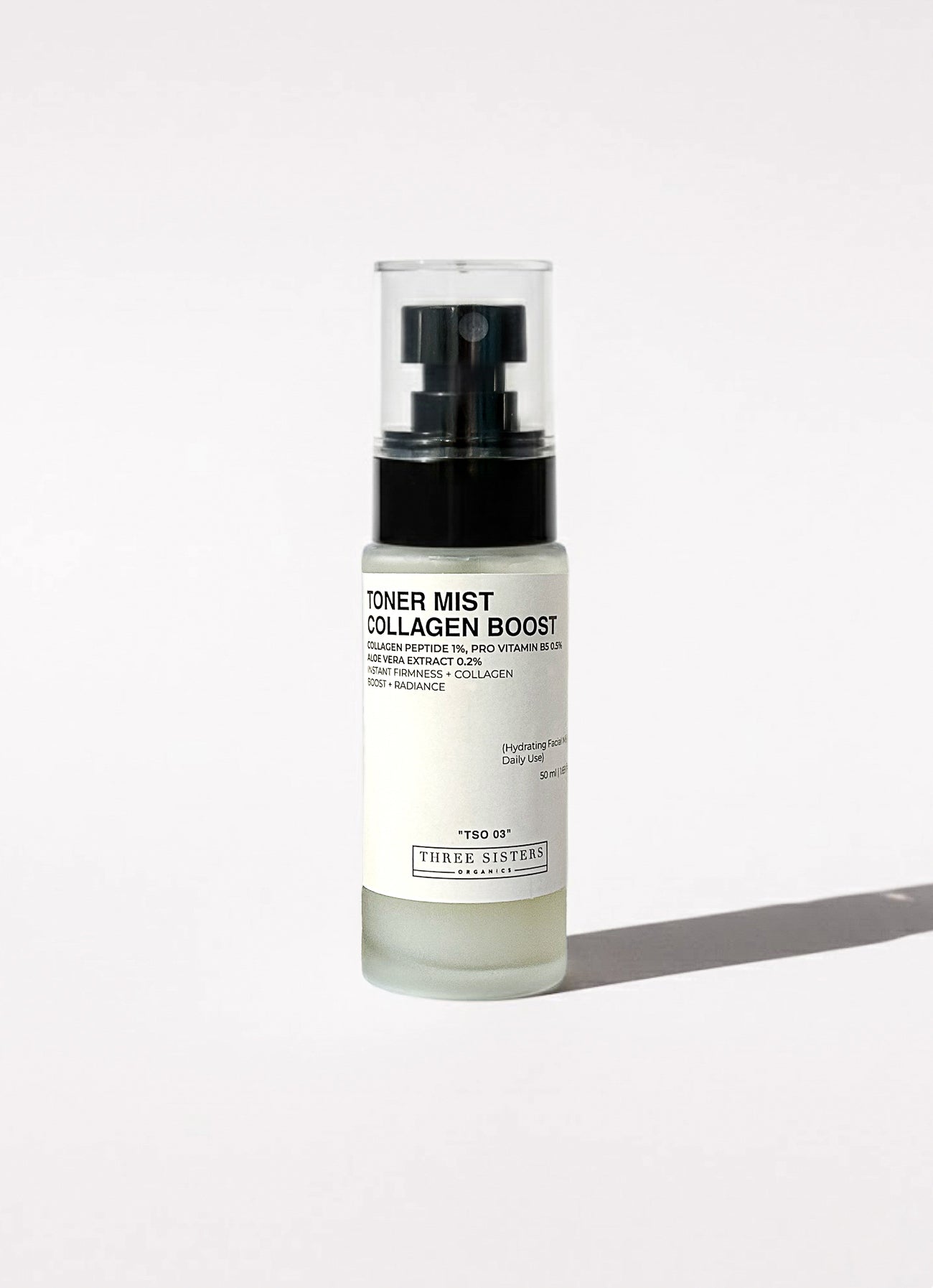 Skincare bottle labeled 'Toner Mist Collagen Boost' on a white background