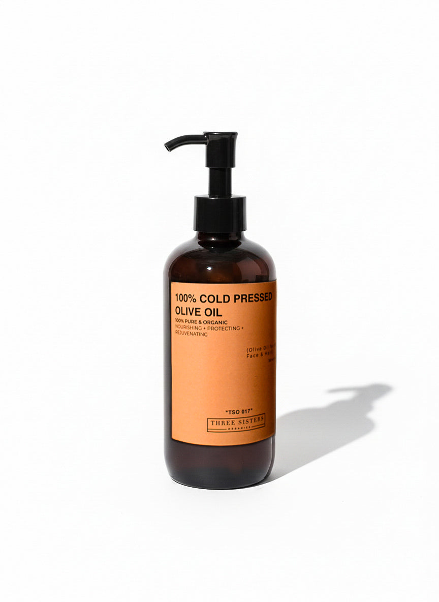 Bottle of 100% Cold Pressed Olive Oil with pump on a white background